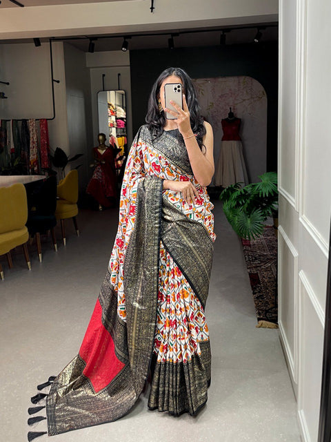 Black Dola silk sarees are known for their colourful diversity and geometric designs with patola print - ReadyToWearshop
