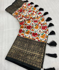 Black Dola silk sarees are known for their colourful diversity and geometric designs with patola print - ReadyToWearshop