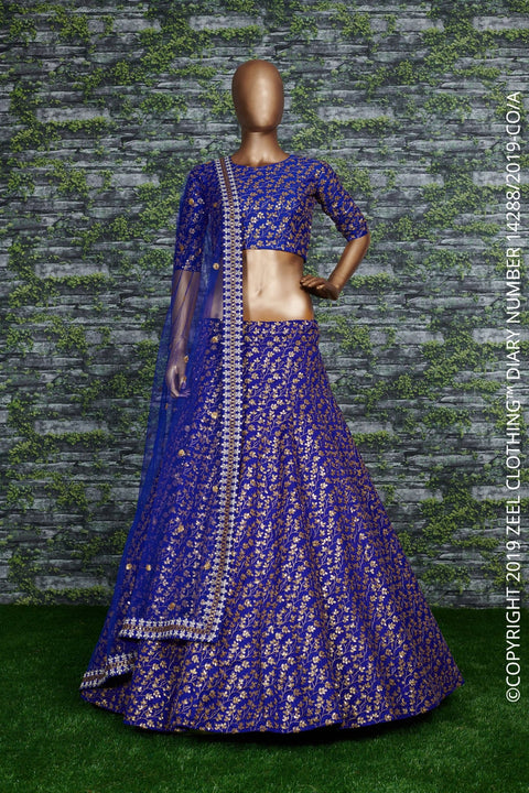 blue Raw silk lehenga with golden zari embroidered in vine pattern accentuated with golden sequins all over lehenga choli for women - ReadyToWearshop
