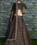 Featuring a black[color] Raw silk leheng pattern with golden sequins all over lehenga choli for women - ReadyToWearshop