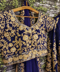 Give yourself an unique look by wearing this exquisite navy blue color silk lehenga set. - ReadyToWearshop