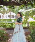 Glam and glow with ethnic beauty at the coming party by draping this colorful organza lehenga choli - ReadyToWearshop