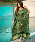Green kaftan is perfect your style. It's your time to add this beauty to your wardrobe and rock the shaadi season - ReadyToWearshop