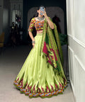 Green luxurious Tussar silk fabric ensures comfort and elegance, making this lehenga choli for women - ReadyToWearshop