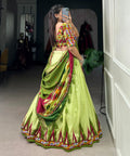Green luxurious Tussar silk fabric ensures comfort and elegance, making this lehenga choli for women - ReadyToWearshop