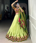 Green luxurious Tussar silk fabric ensures comfort and elegance, making this lehenga choli for women - ReadyToWearshop