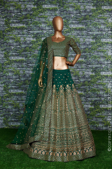 Green raw silk blouse adorned with gold sequin embroidery lehenga choli for women - ReadyToWearshop