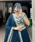 Teal Blue Elevate Your Ethnic Wardrobe with a Gorgeous Georgette Lehenga Choli and an Intricately Embroidered Banglory Blouse For Women - ReadyToWearshop
