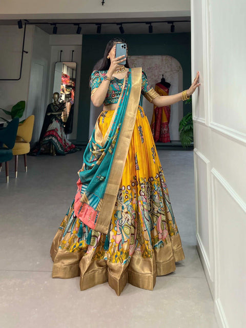 Yellow Elegance of Dola Silk and the intricate charm of Kalamkari prints, the lehenga choli whispers tales of tradition and beauty - ReadyToWearshop